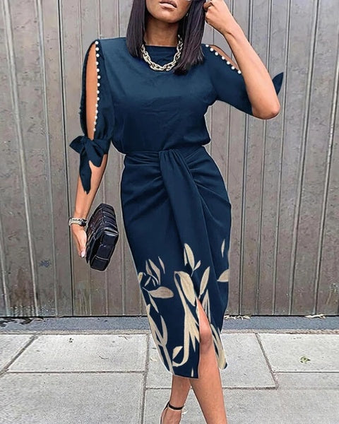 Belinda Geknoopte jurk met parels en botanische print