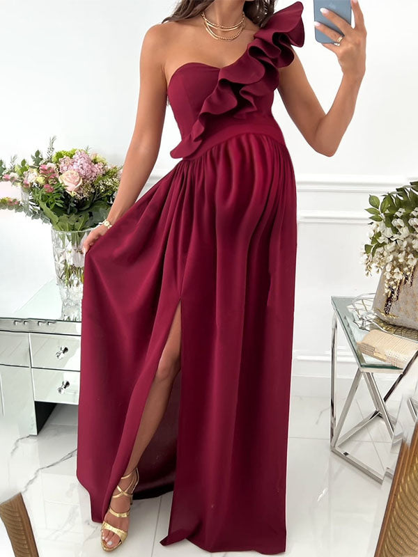 Lange zwangerschapsjurk met ruches en asymmetrisch ontwerp