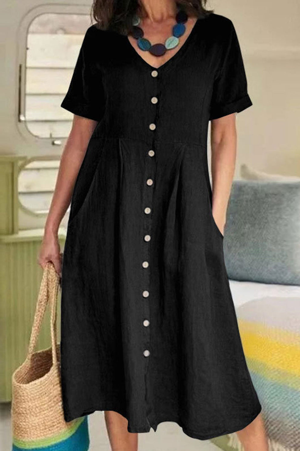 Licht midi-jurkje met korte mouwen en knoopsluiting in T-shirtstijl