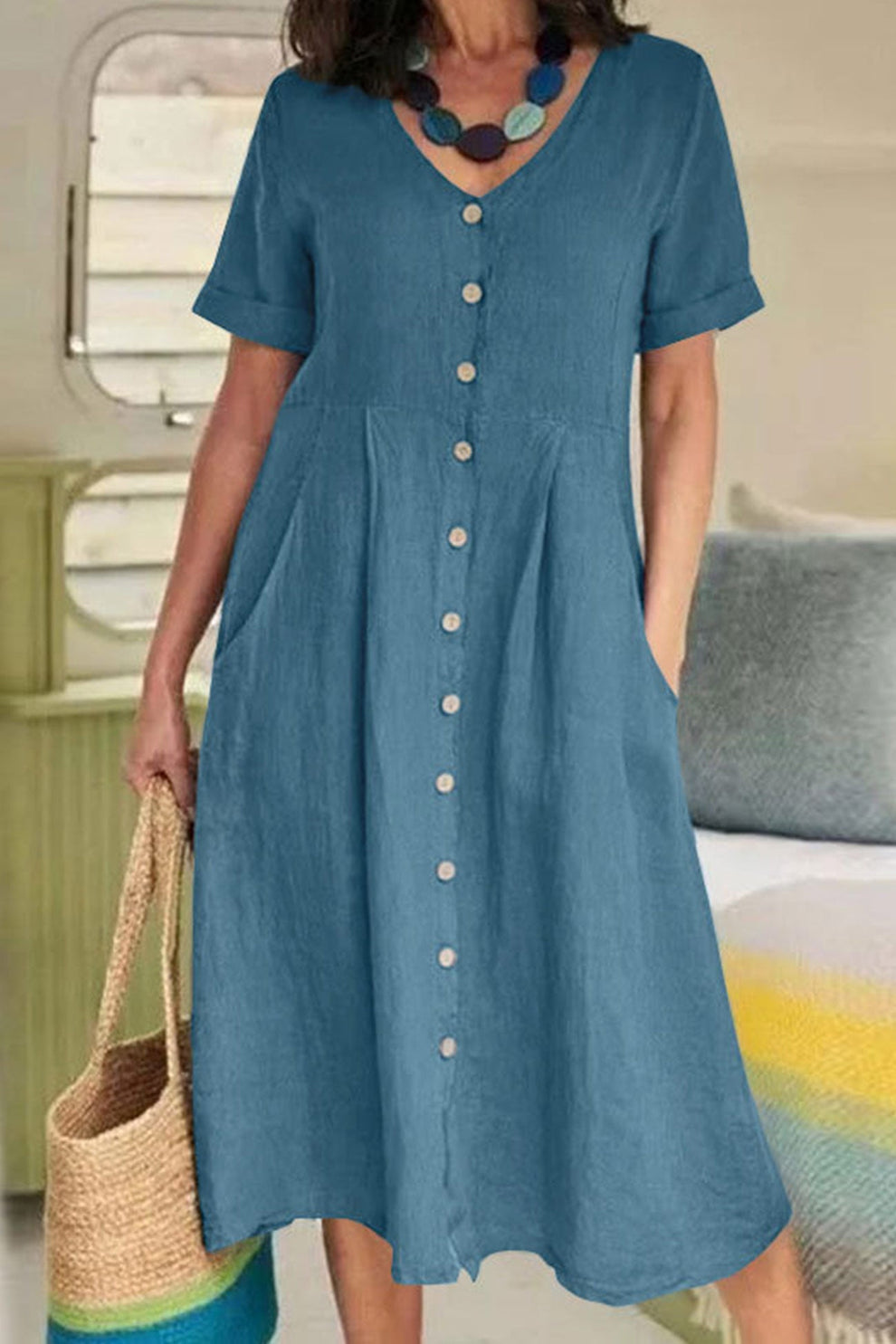 Licht midi-jurkje met korte mouwen en knoopsluiting in T-shirtstijl