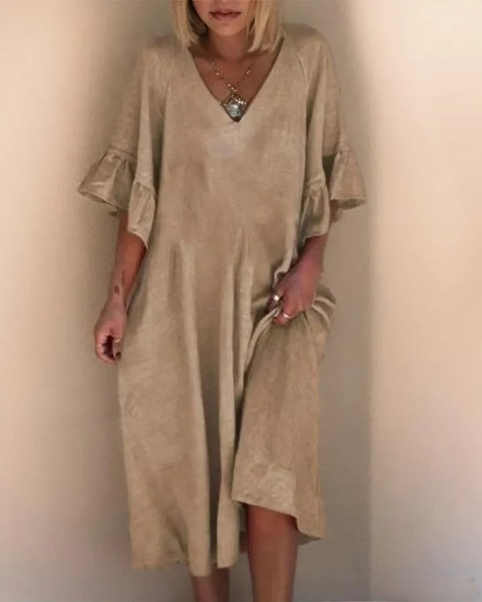 Dakota Elegante, losjes genaaide jurk met Vhals in een effen kleur