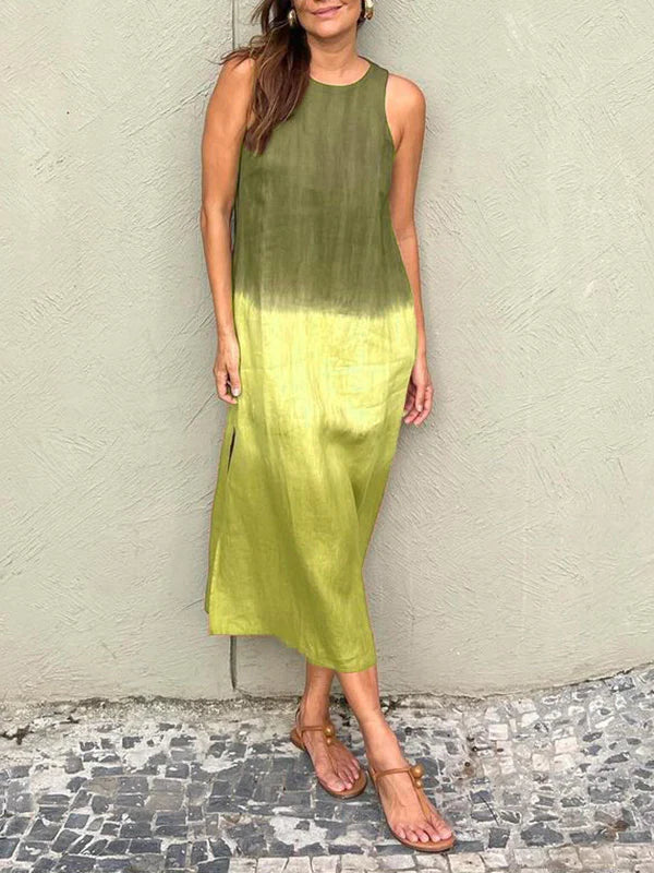 Penelope Mouwloze maxijurk met gelaagde split in tiedye