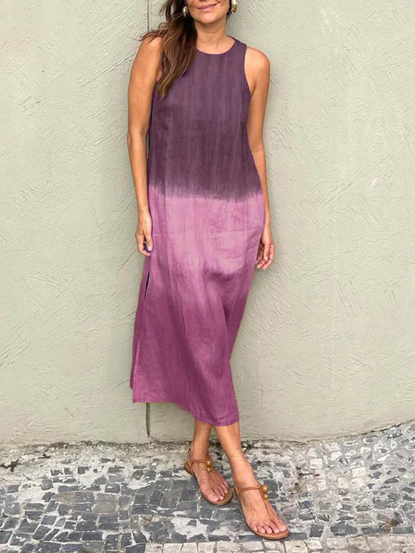 Penelope Mouwloze maxijurk met gelaagde split in tiedye