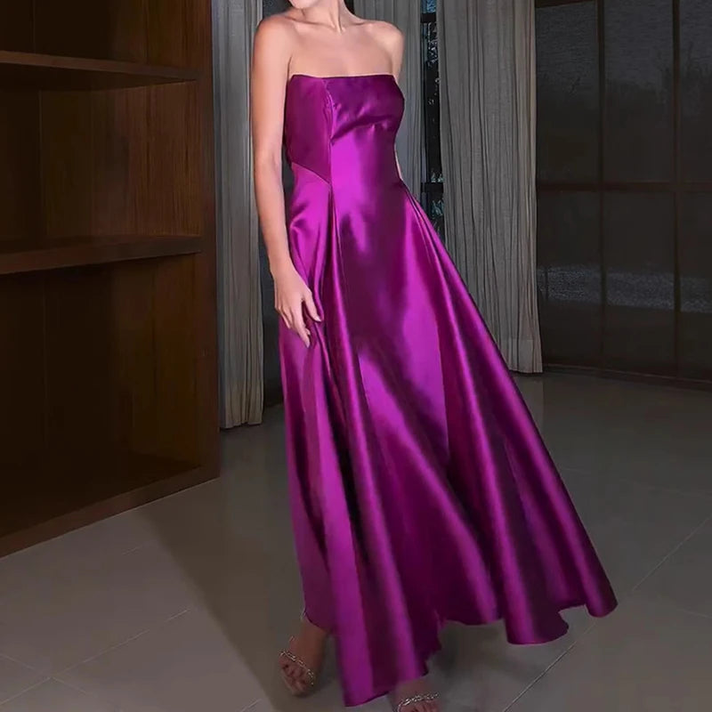 Lange strapless avondjurk met elegante brede plooien