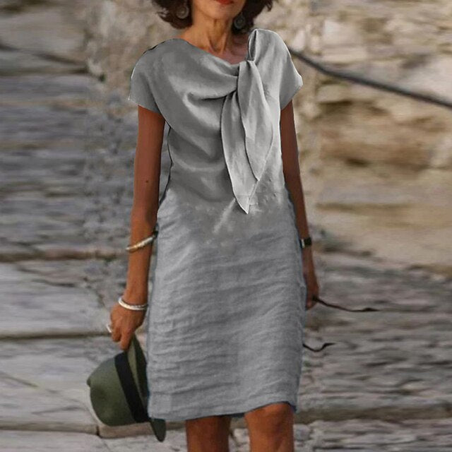 Casual en elegante midi-jurk met strik in het ontwerp