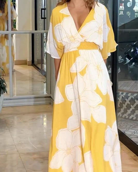 Bloemen maxi jurk met vleermuismouwen