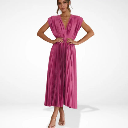 Lange plooirok met diepe halslijn en elegante stijl