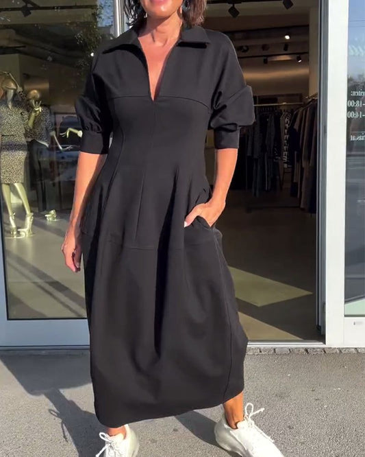 Minimalistische midi-jurk met een gestructureerde en moderne stijl