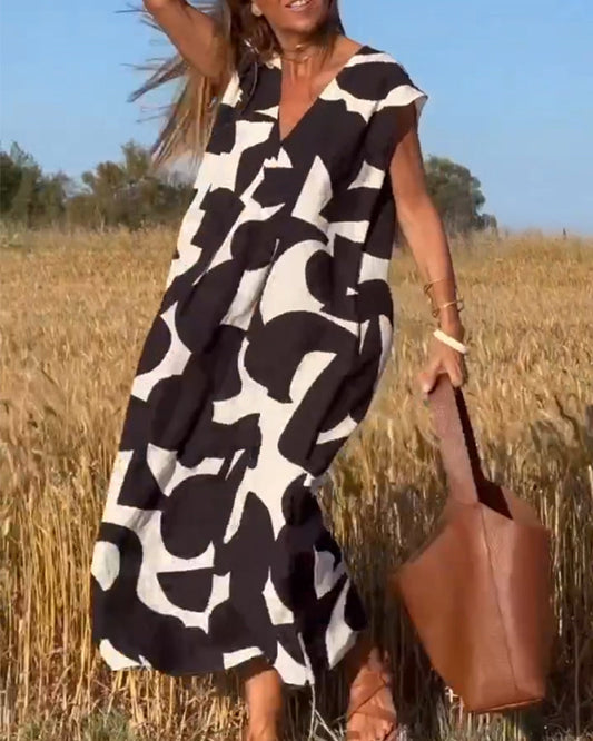JURK MET PRINT EN V-HALSBAND