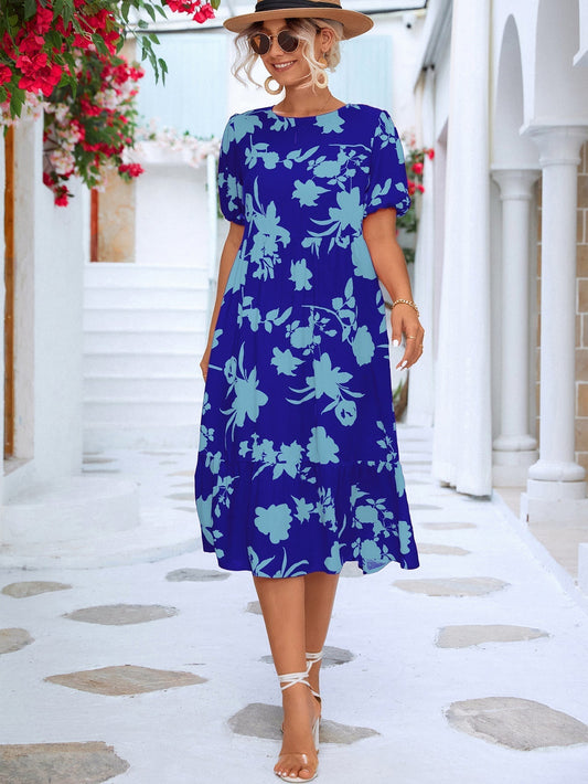 Bloemen midi-jurk met pofmouwtjes en ruches aan de zoom