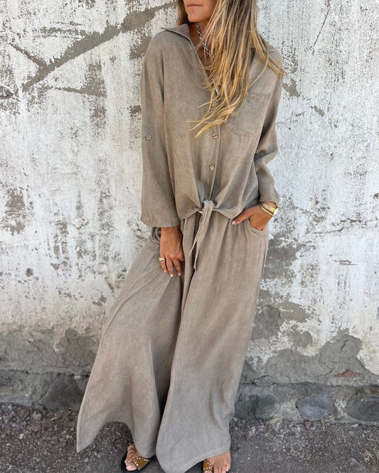 LD | Elegante dameszomeroutfit met wijde broek en knoopblouse met lange mouwen