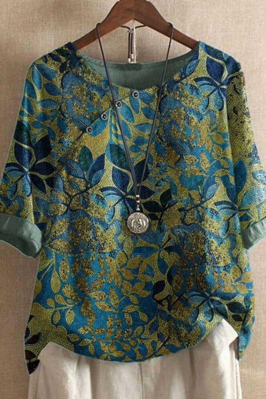 Emma - Blouse met halflange mouwen en ronde hals met bladmotief