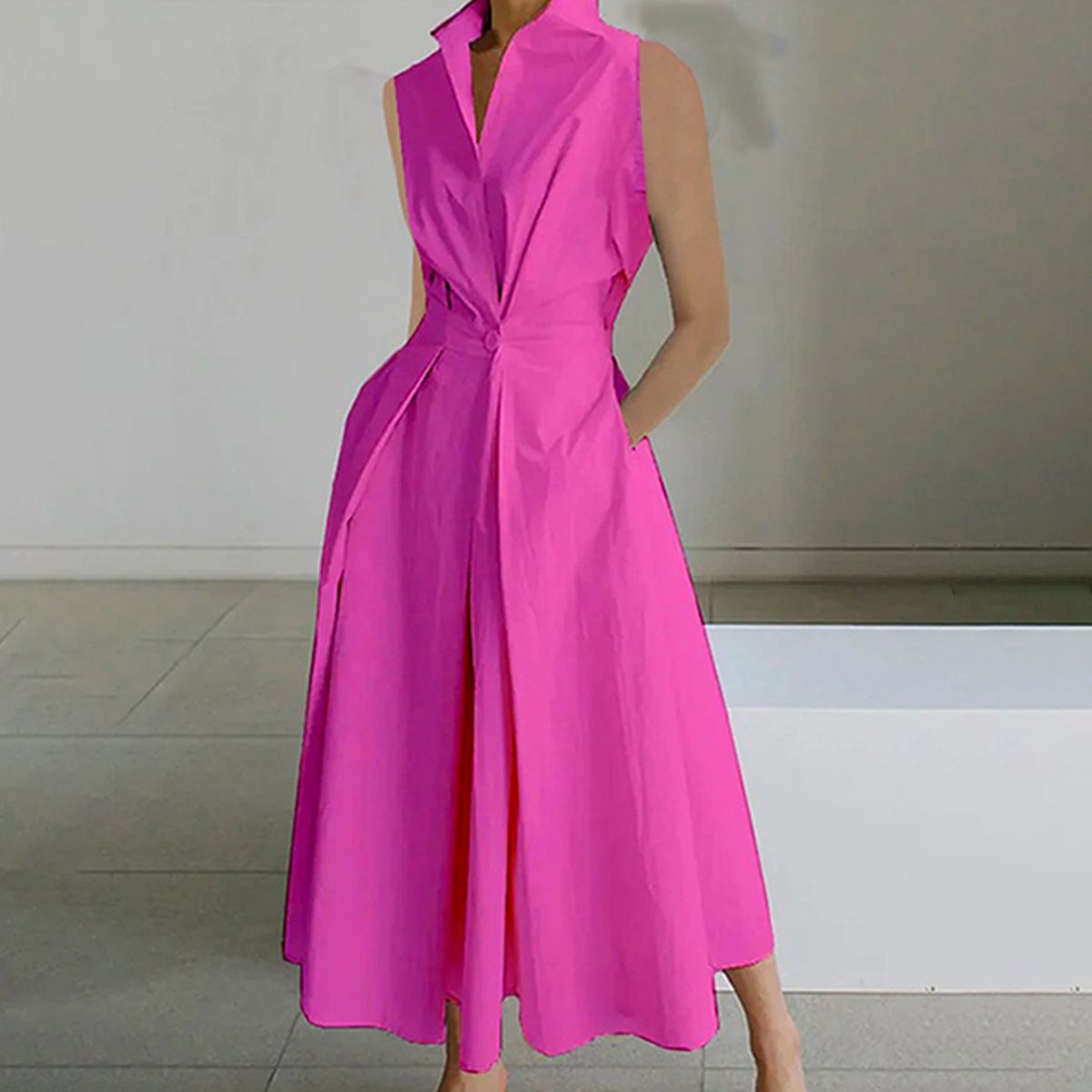 Lange mouwloze jurk in roze-rode kleur
