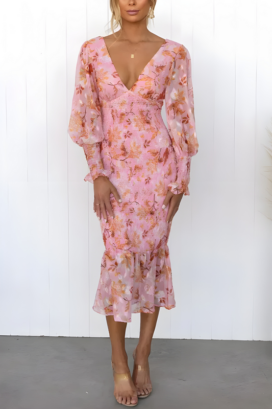 Vloeiende midi-jurk met lange mouwen en subtiele bloemenprint voor een elegante look
