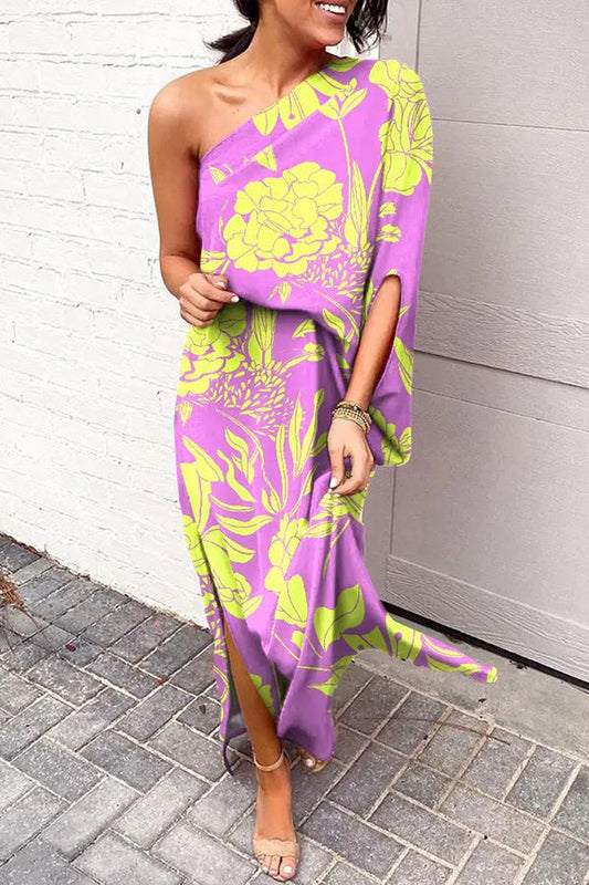 Asymmetrische lange jurk met elegante print en split aan de zijkant
