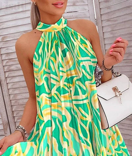 Plooirok cocktailjurk zonder mouwen met print