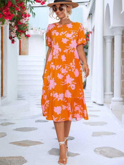 Bloemen midi-jurk met pofmouwtjes en ruches aan de zoom