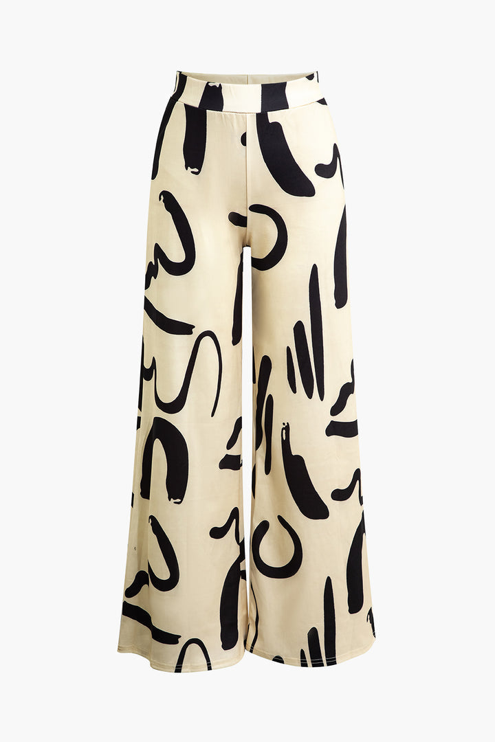 Florence - Broek met wijde pijpen en abstracte print