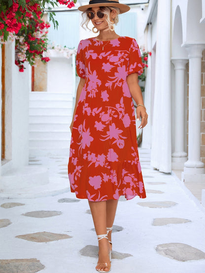 Bloemen midi-jurk met pofmouwtjes en ruches aan de zoom