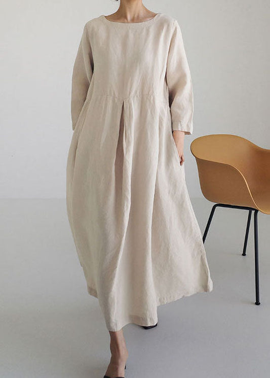 Lange jurk met patchworkmotief en praktische zakken