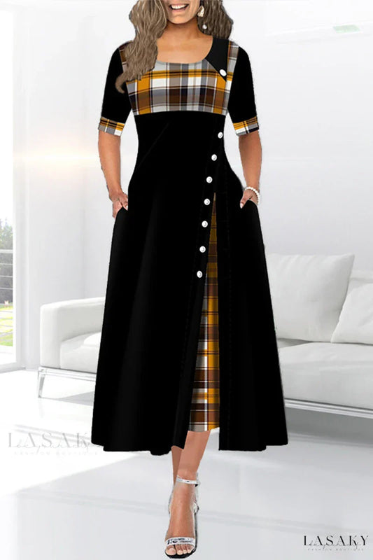 Devora Zwarte patchworkjurk met taillehals en rok in vintage in vintage stijl