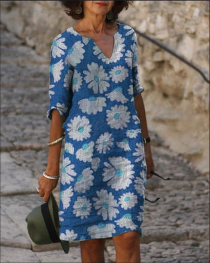 Dolores Vintage midijurk met Vhals en halve mouwen