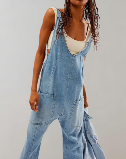 Nadine - Mouwloze denim jumpsuit met diepe V-hals en broek met meerdere zakken