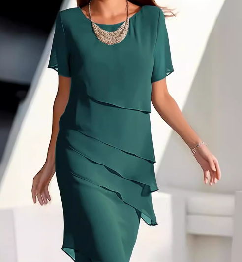 Natalia Effen mouwloze mini jurk