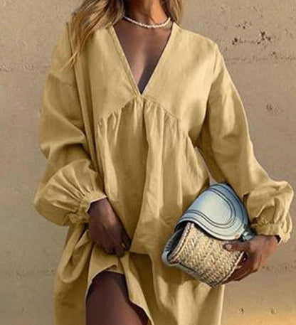 Nikita Casual jurk met Vhals en geplooide lantaarnmouwen