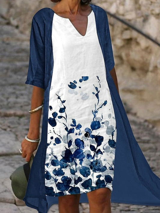 Nollie Tweedelige midijurk met blauwe bloemenprint en elegante halve mouwen