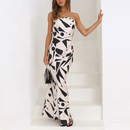 Maxi-jurk dicht op de schouder met geometrische print