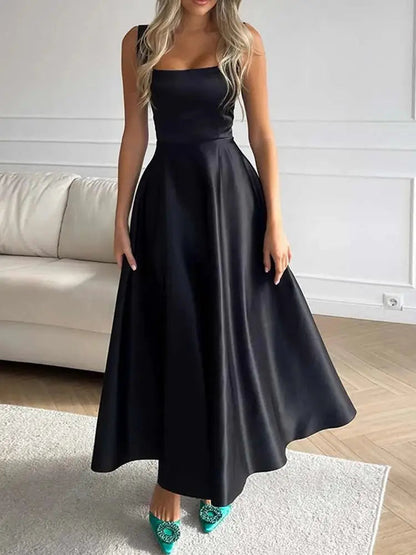 Midi-avondjurk met spaghettibandjes en wijde elegante rok