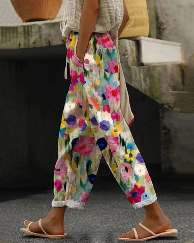 Joggingbroek met zakken en kleurrijke bloemenprint