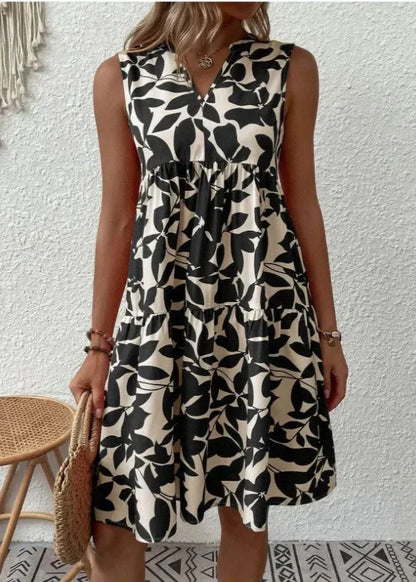 Elegante zomerjurk met V-hals en vrouwelijke silhouet