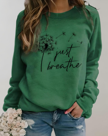 Sara - Trui met ronde hals en opschrift "Just Breath