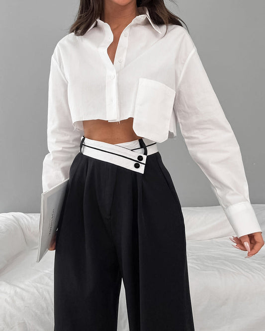 Mona - Broek met wijde pijpen en asymmetrische tailleband