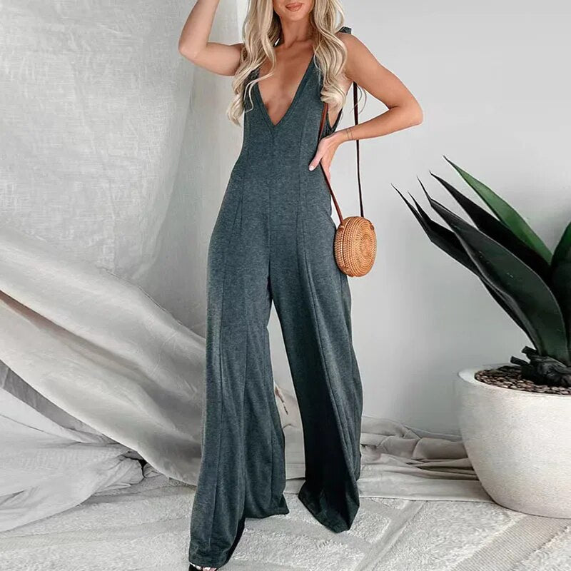 Véronique - Dames jumpsuit met diepe V-hals en geknoopte schouders