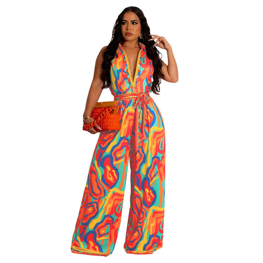 Camille - Wijd uitgesneden jumpsuit met strikje en abstracte print voor dames