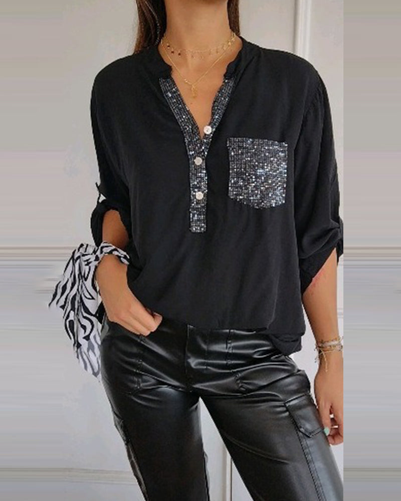 Losse blouse met pailetten