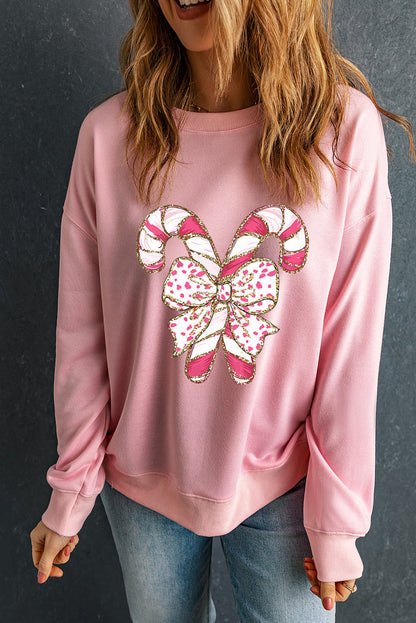 Sharon | Sweatshirt Met Hangende Schouders, Kerstgrafiek En Roze Lint