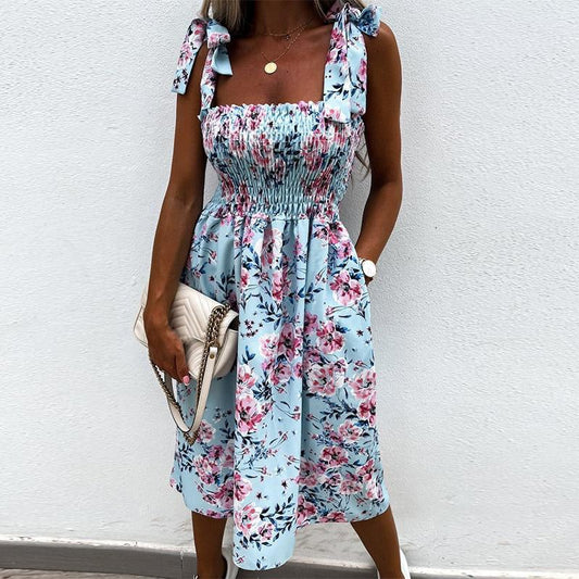 "Mirella" designerjurk met bloemenpatroon
