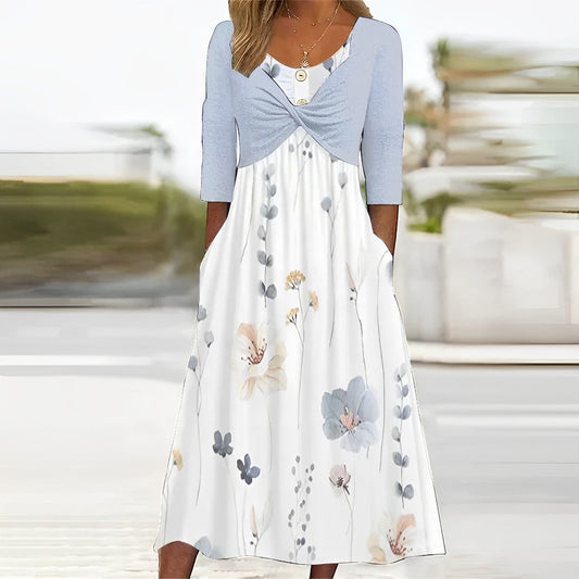 - Blauwe jurk met print