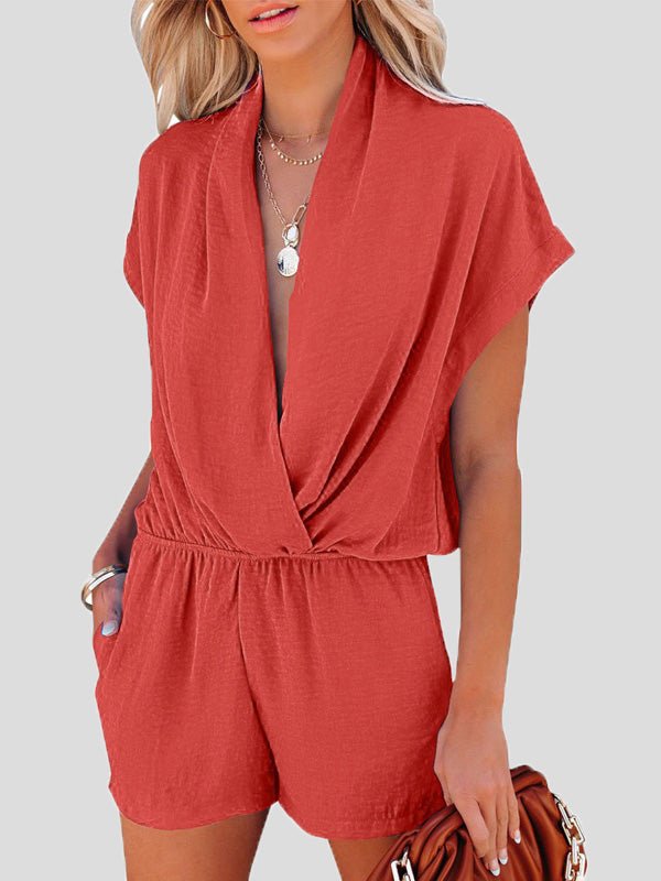 -jumpsuit met een diepe pasvorm en gekruiste zakken voor een losse pasvorm.